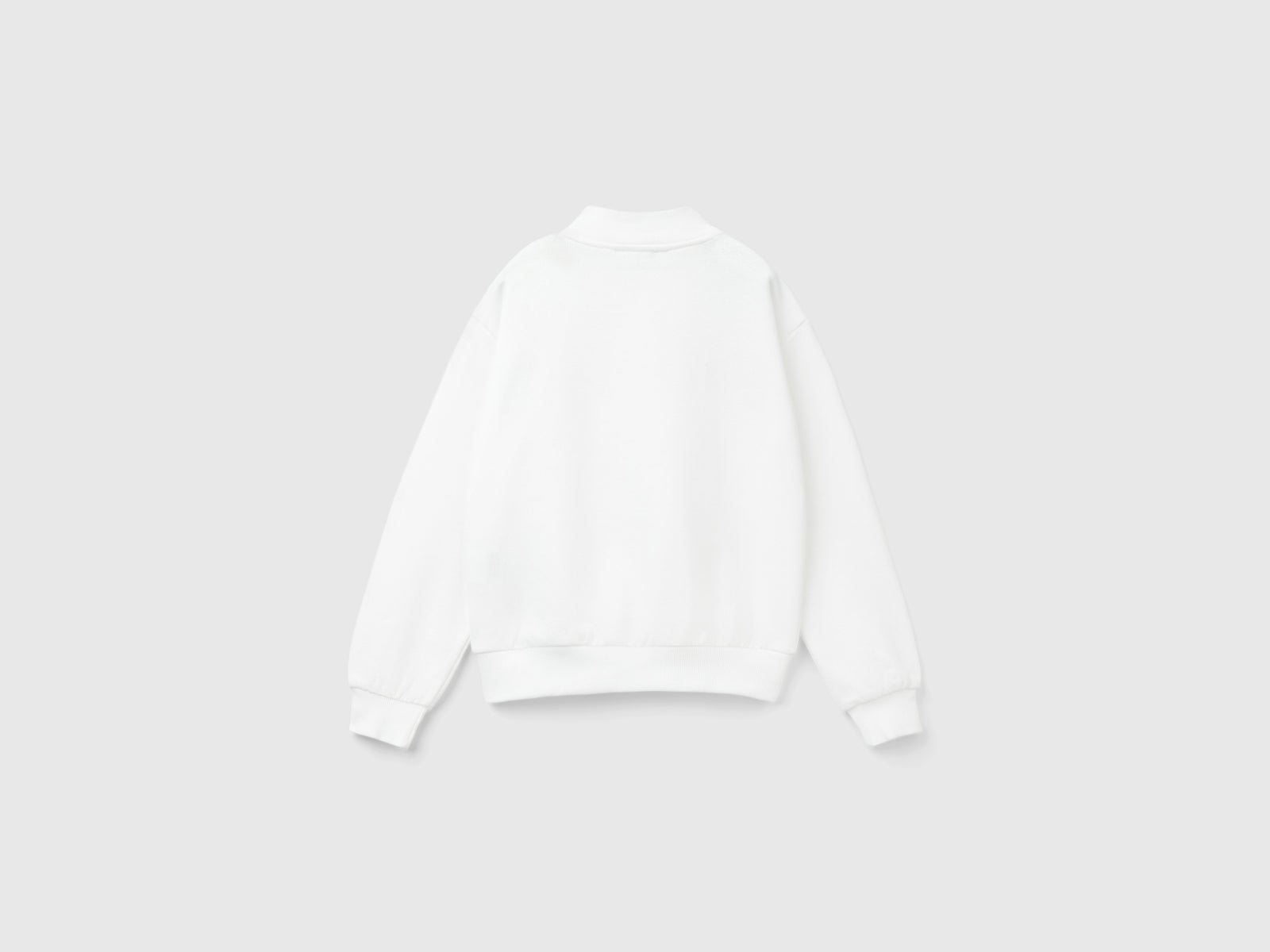 Felpa con zip e colletto da bambina bianco panna 2 | Benetton Outlet