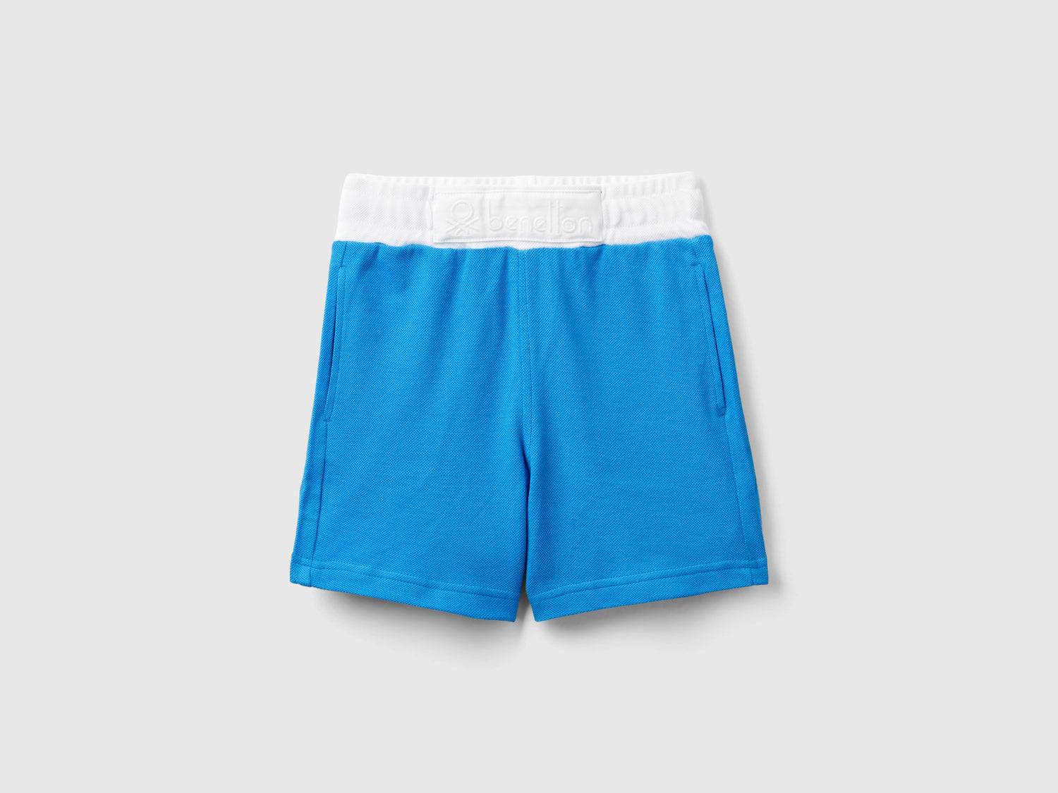 Pantaloni corti con coulisse da bimbo blu | Benetton Outlet