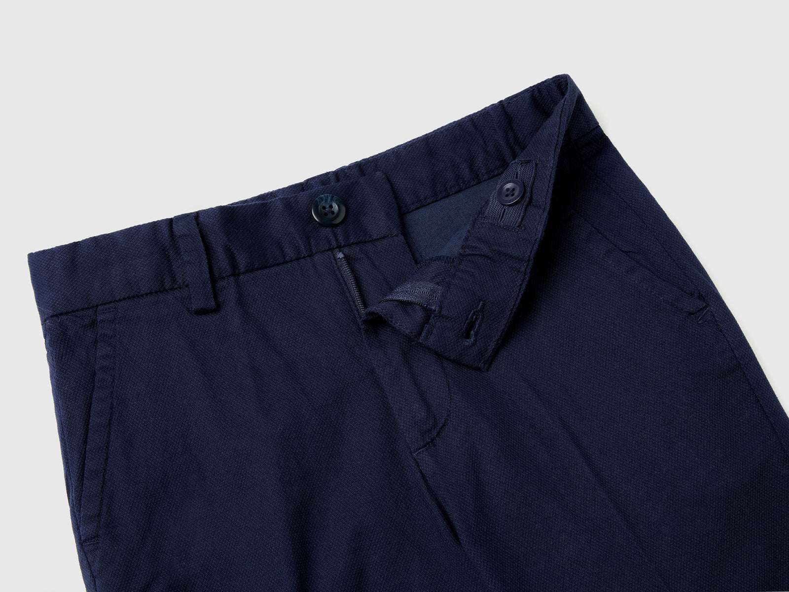 Chino slim fit in cotone stretch da bambino blu scuro 3 | Benetton Outlet