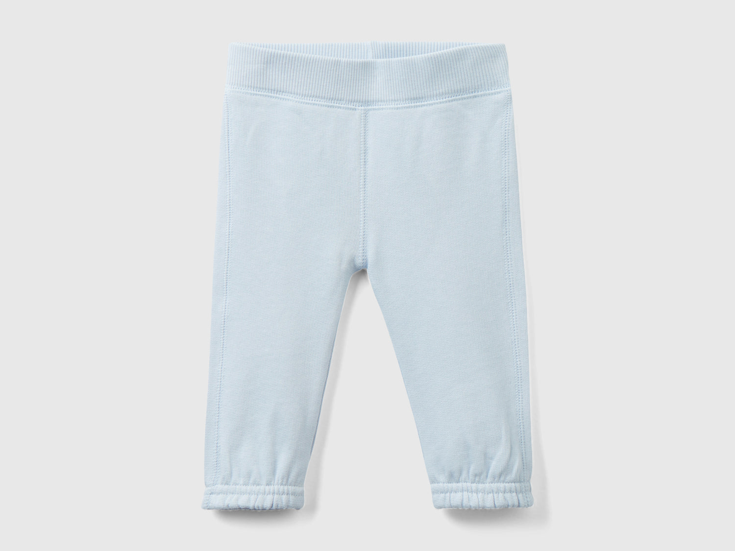 Pantaloni in felpa di cotone bio da neonato celeste | Benetton Outlet