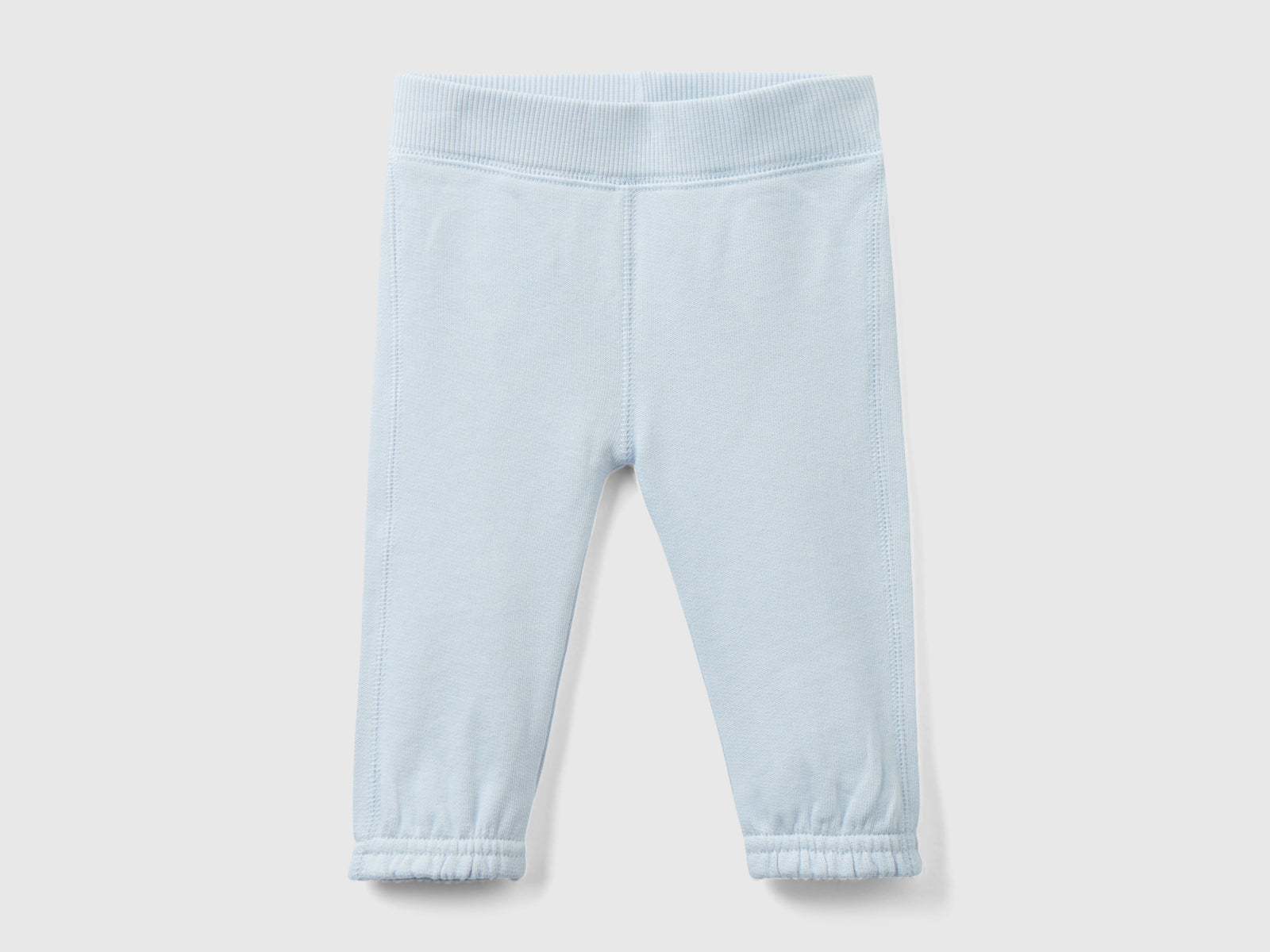 Pantaloni in felpa di cotone bio da neonato celeste | Benetton Outlet