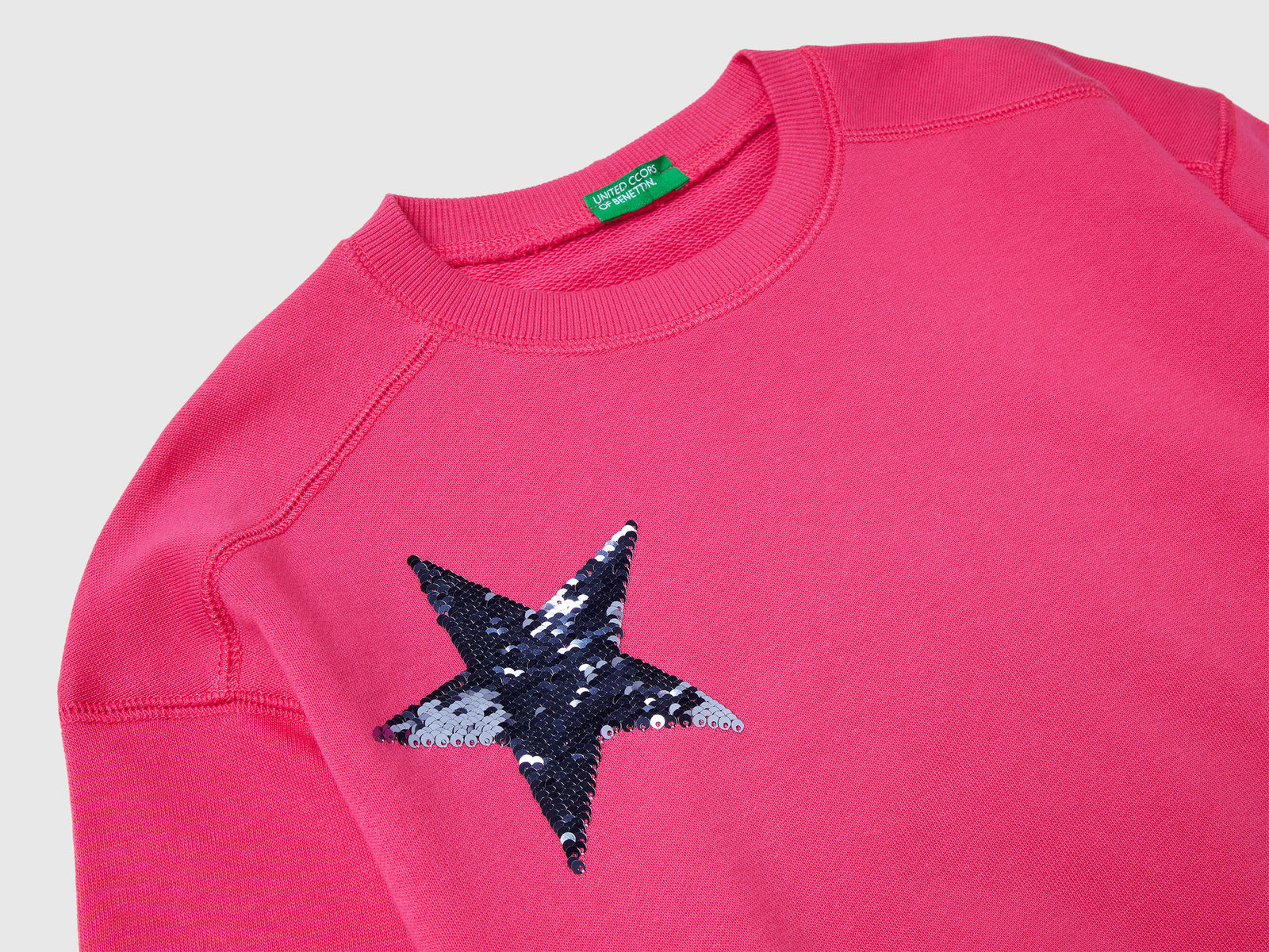 Felpa con paillettes da bambina fucsia 3 | Benetton Outlet