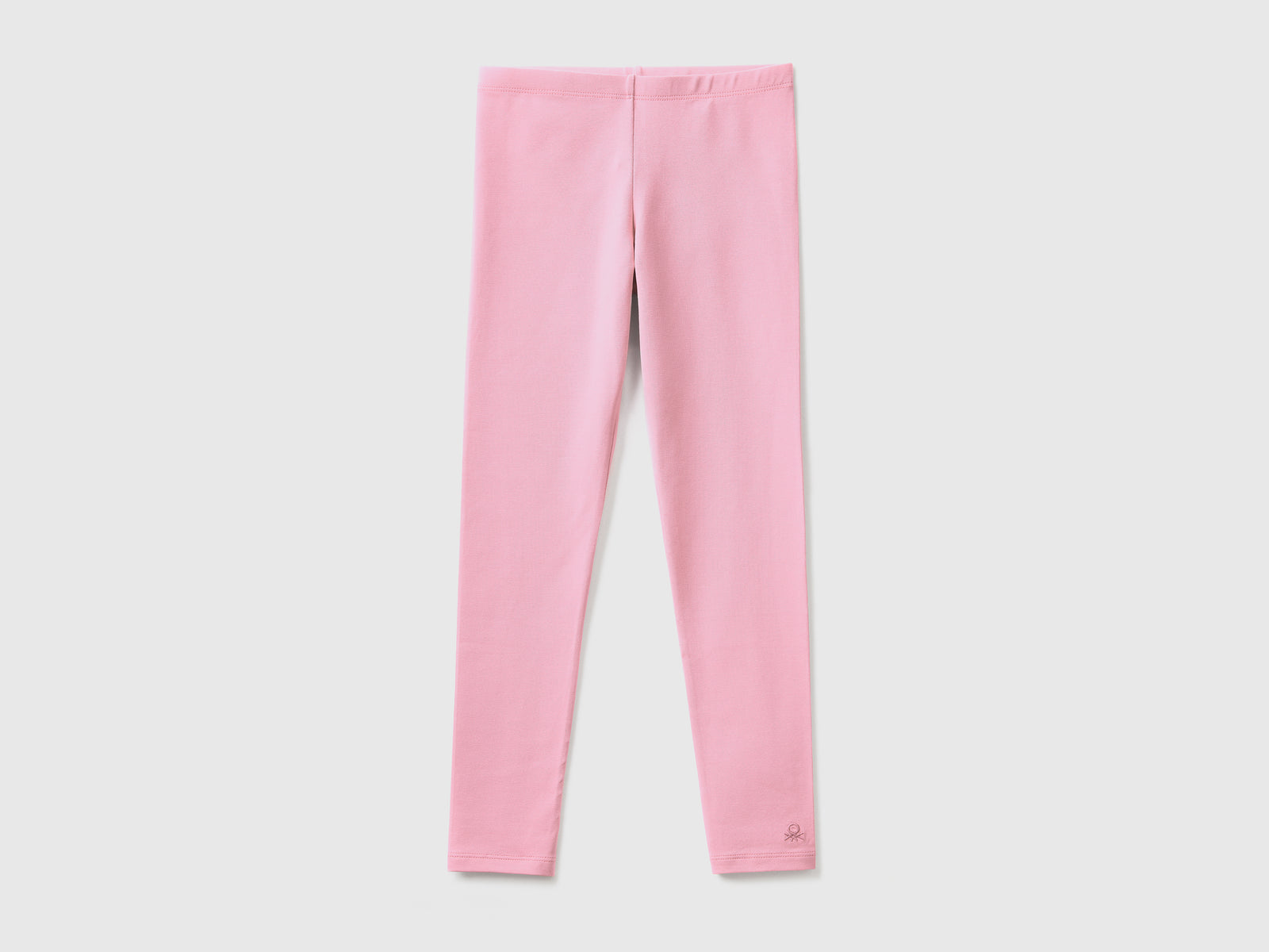Leggings in cotone stretch con logo da bambina rosa | Benetton Outlet