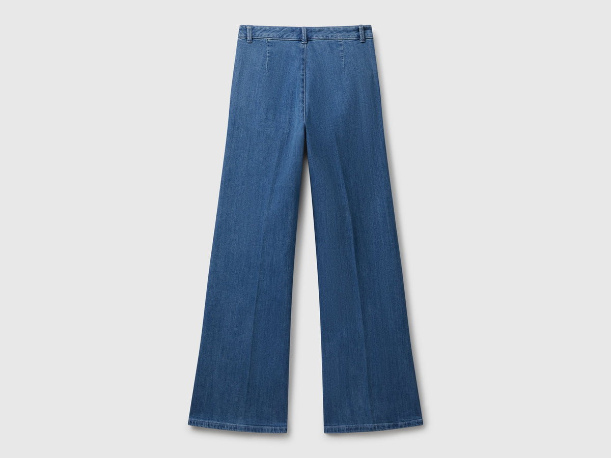 Jeans flare con zip