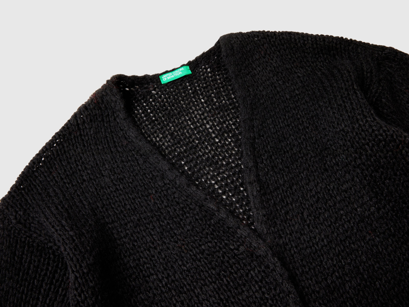 Cardigan over fit in misto lana da bambina nero 3 | Benetton Outlet