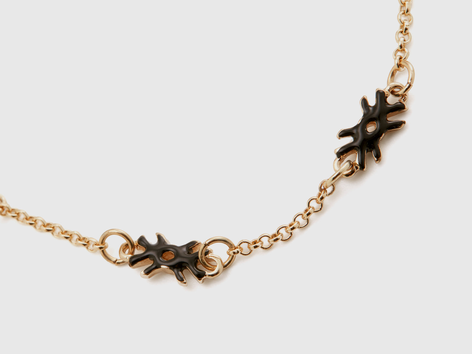 Bracciale con loghi da donna nero 2 | Benetton Outlet