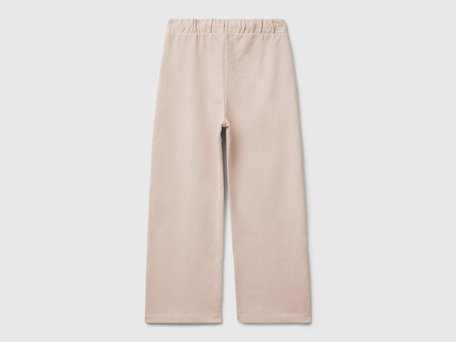Pantaloni ampi in felpa da bambina rosa tenue 2 | Benetton Outlet
