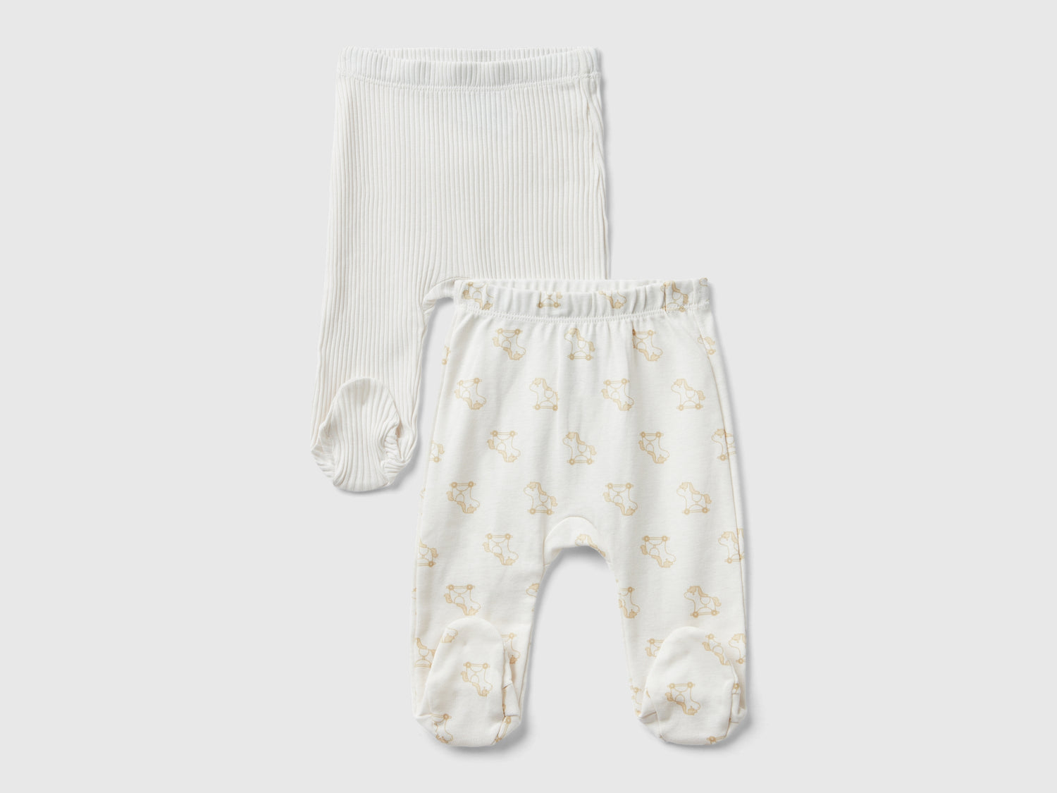 Due pantaloni in cotone bio da neonato bianco panna | Benetton Outlet