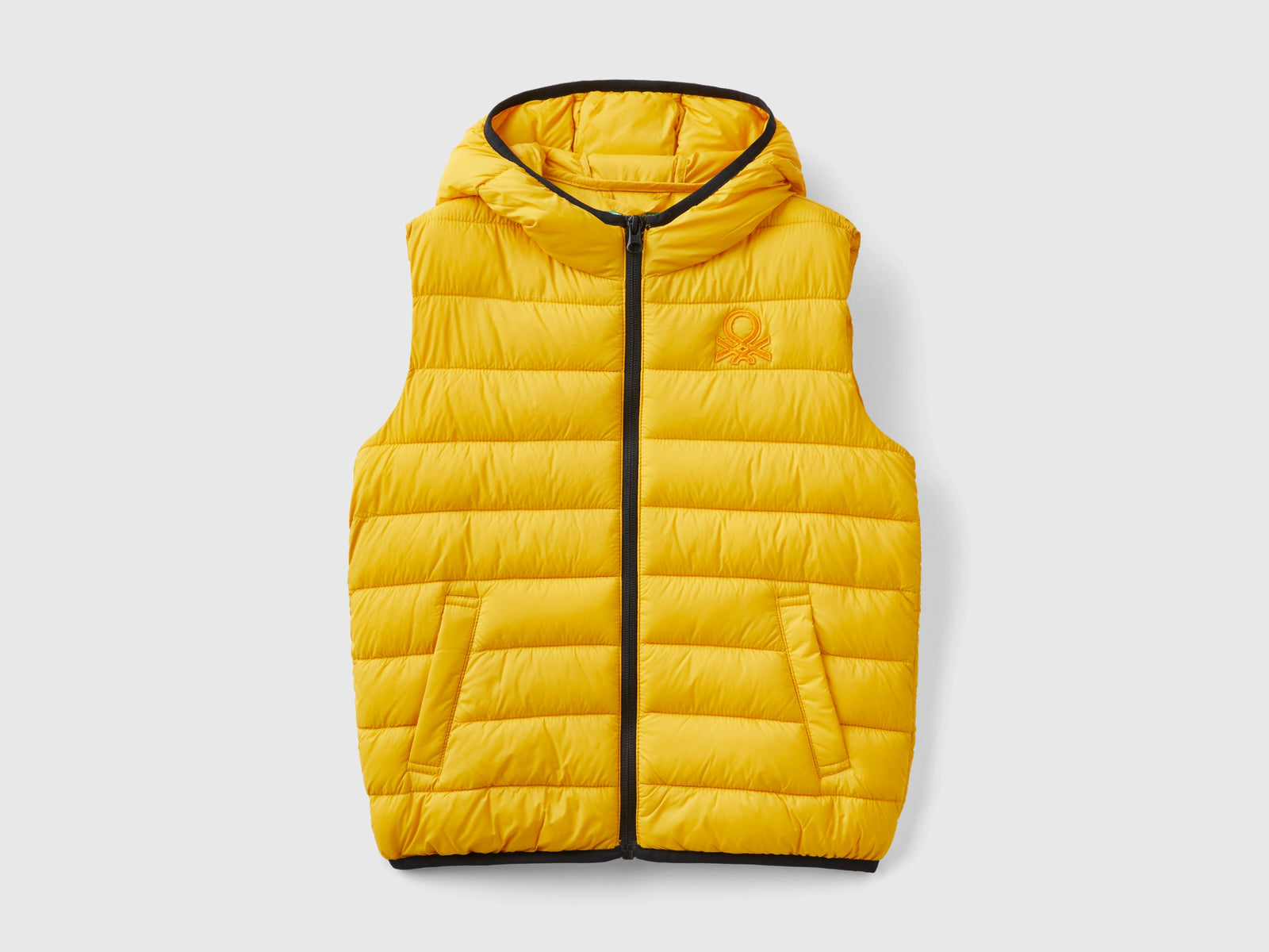 Gilet imbottito con cappuccio da bambino giallo | Benetton Outlet