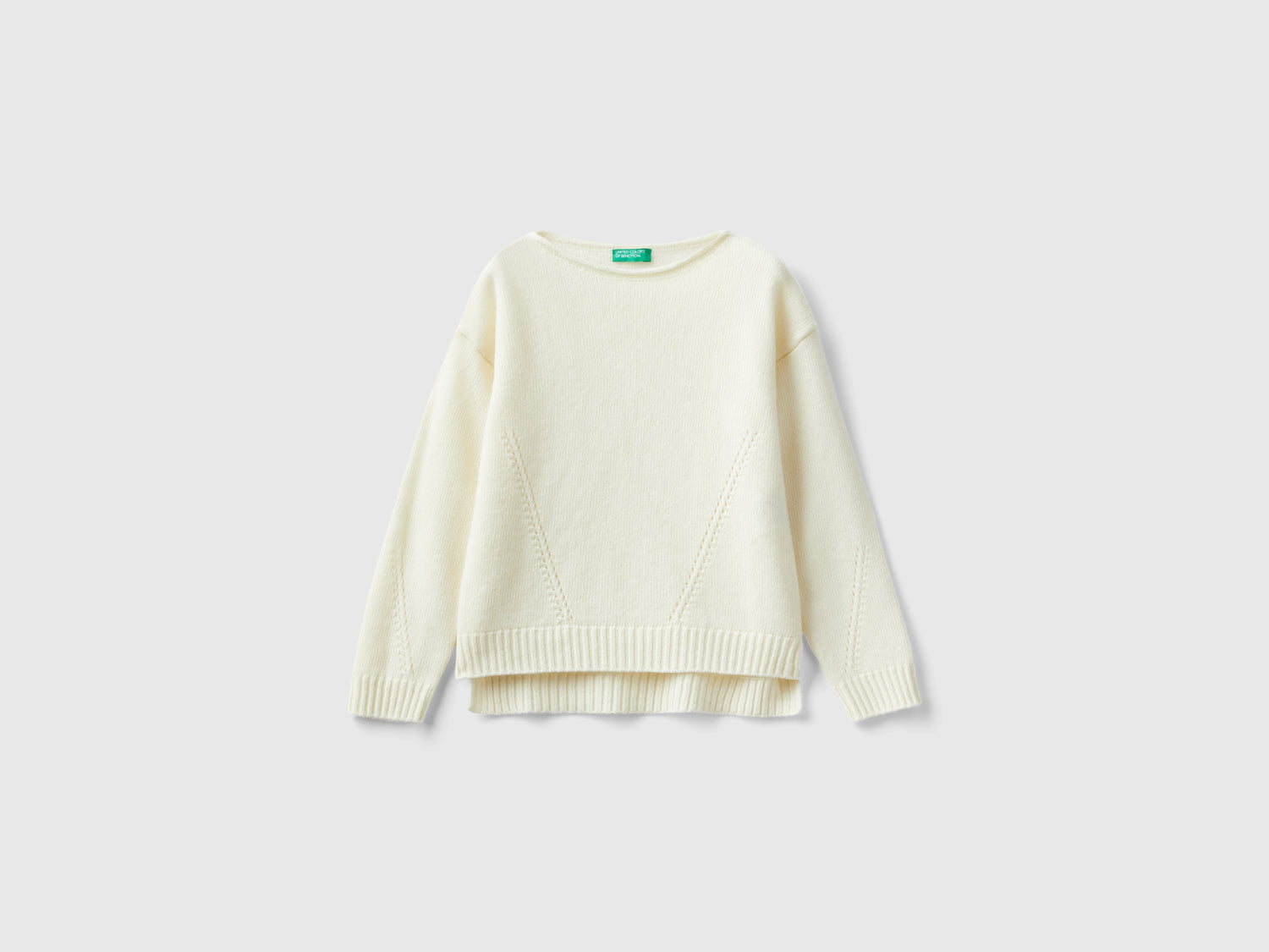 Maglia lavorata con giochi di punti da bambina bianco panna | Benetton Outlet