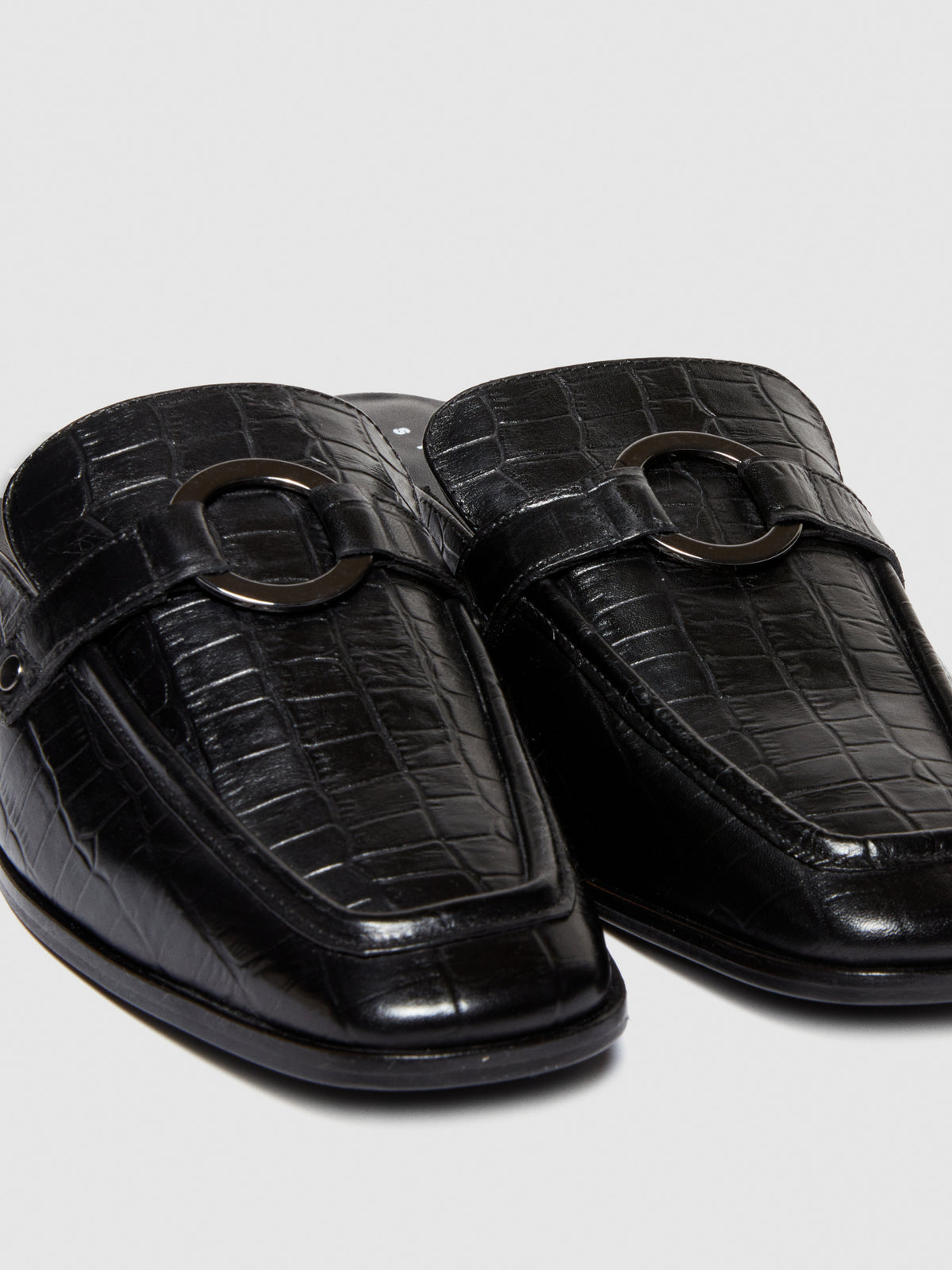 Mules in pelle