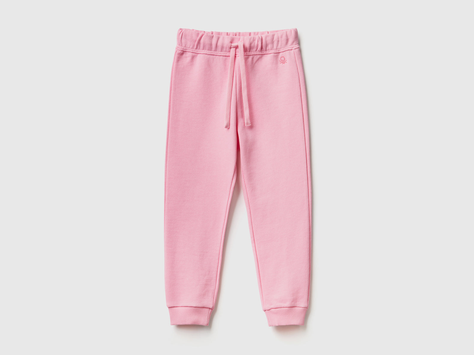 Pantaloni in felpa di cotone da bimba rosa | Benetton Outlet