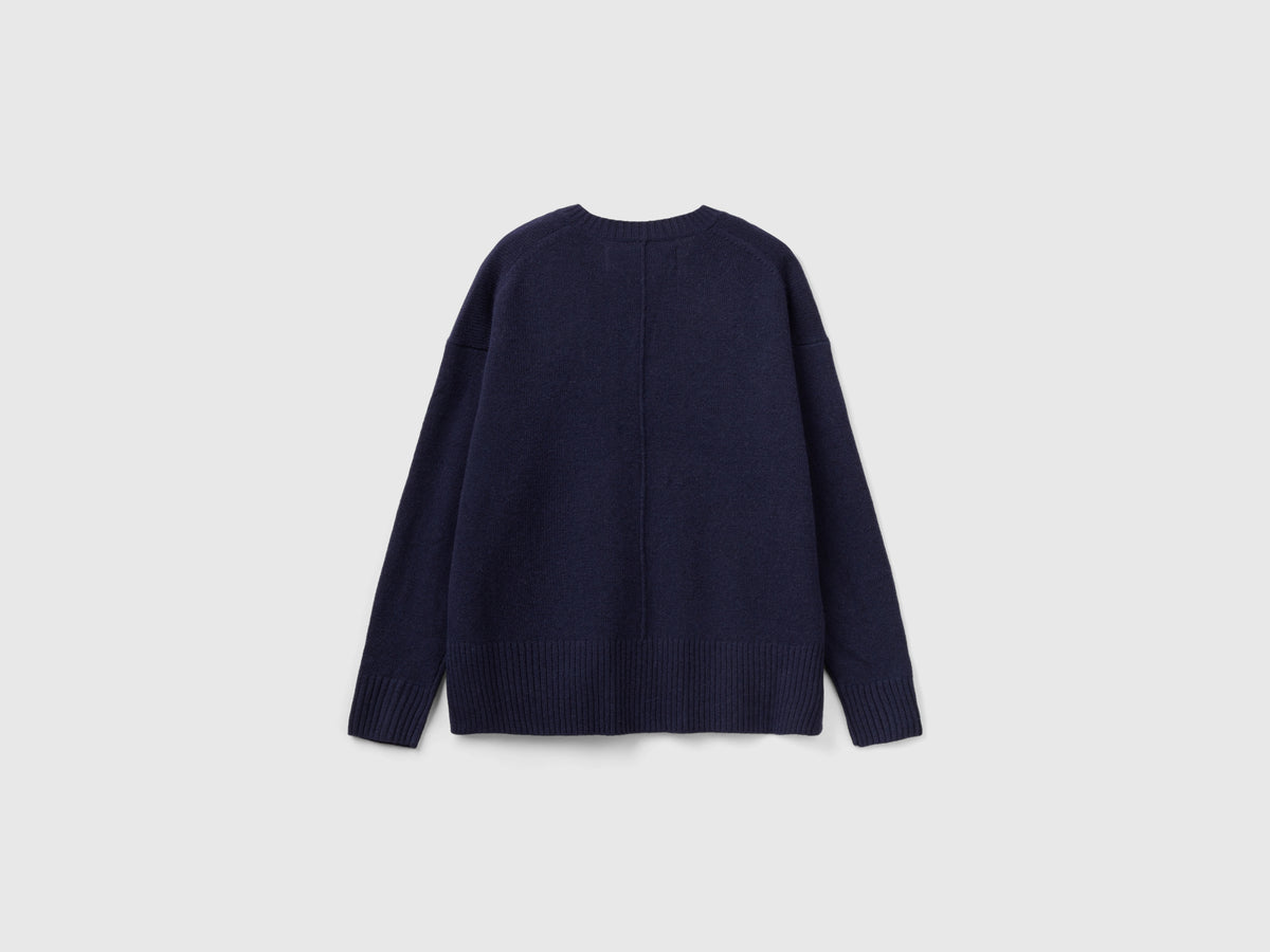 Maglione over fit con spacchi