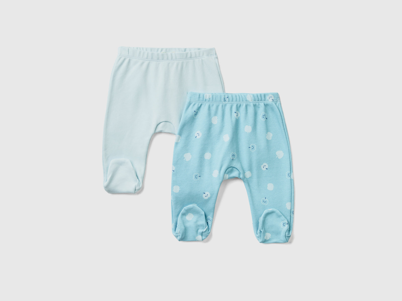 Set composto da due paia di pantaloncini con piedini in puro cotone da neonato azzurro | Benetton Outlet