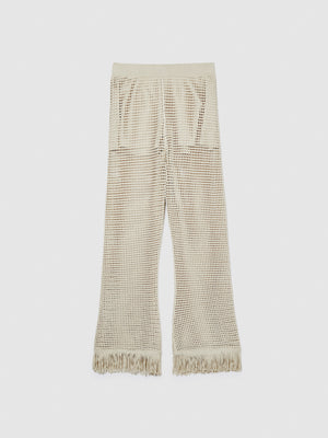 Pantaloni traforati con frange