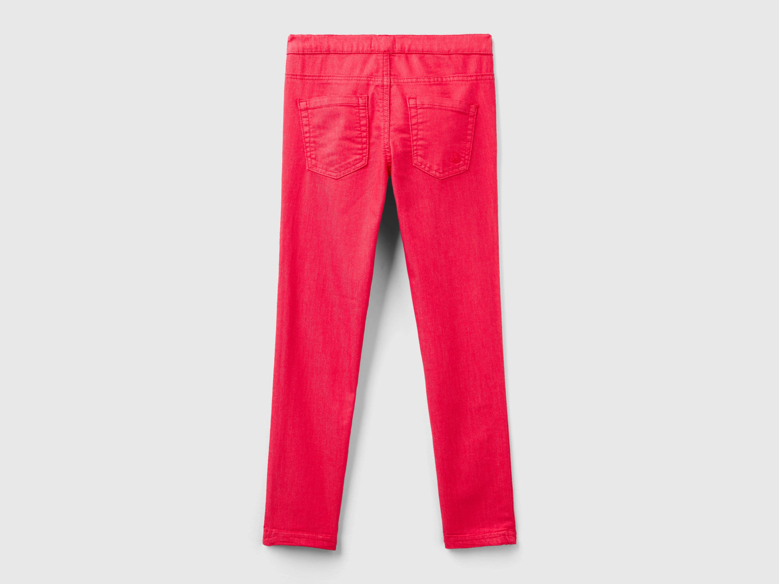 Pantaloni super skinny da bambina fucsia 2 | Benetton Outlet