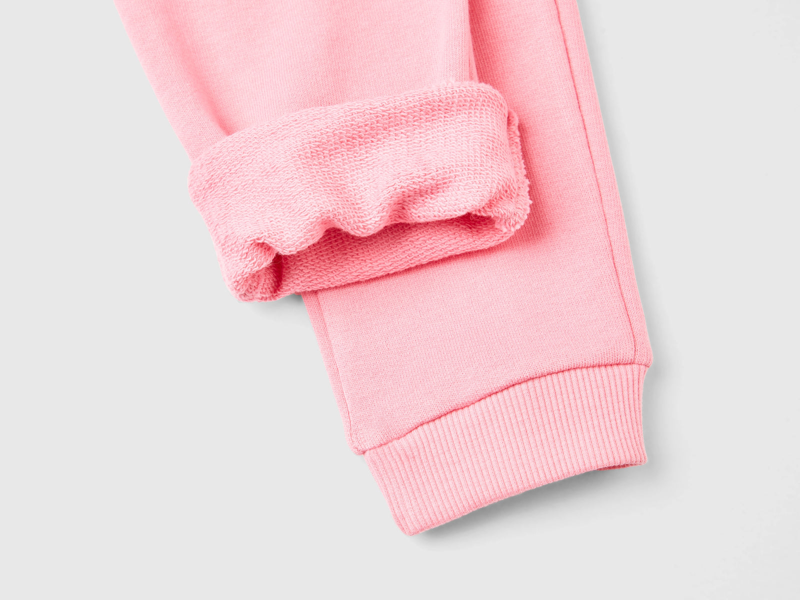 Pantaloni in felpa di cotone bio da bimba rosa 2 | Benetton Outlet