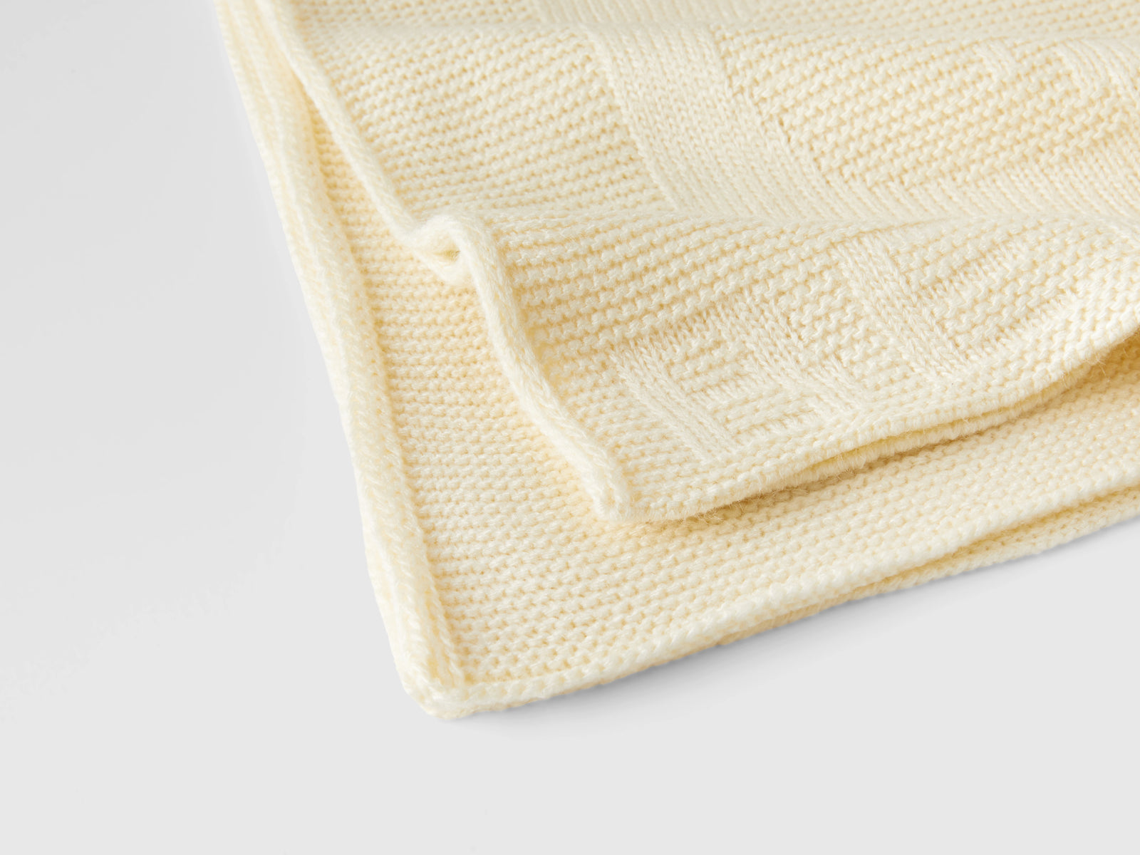 Copertina baby in maglia da neonato bianco panna 2 | Benetton Outlet