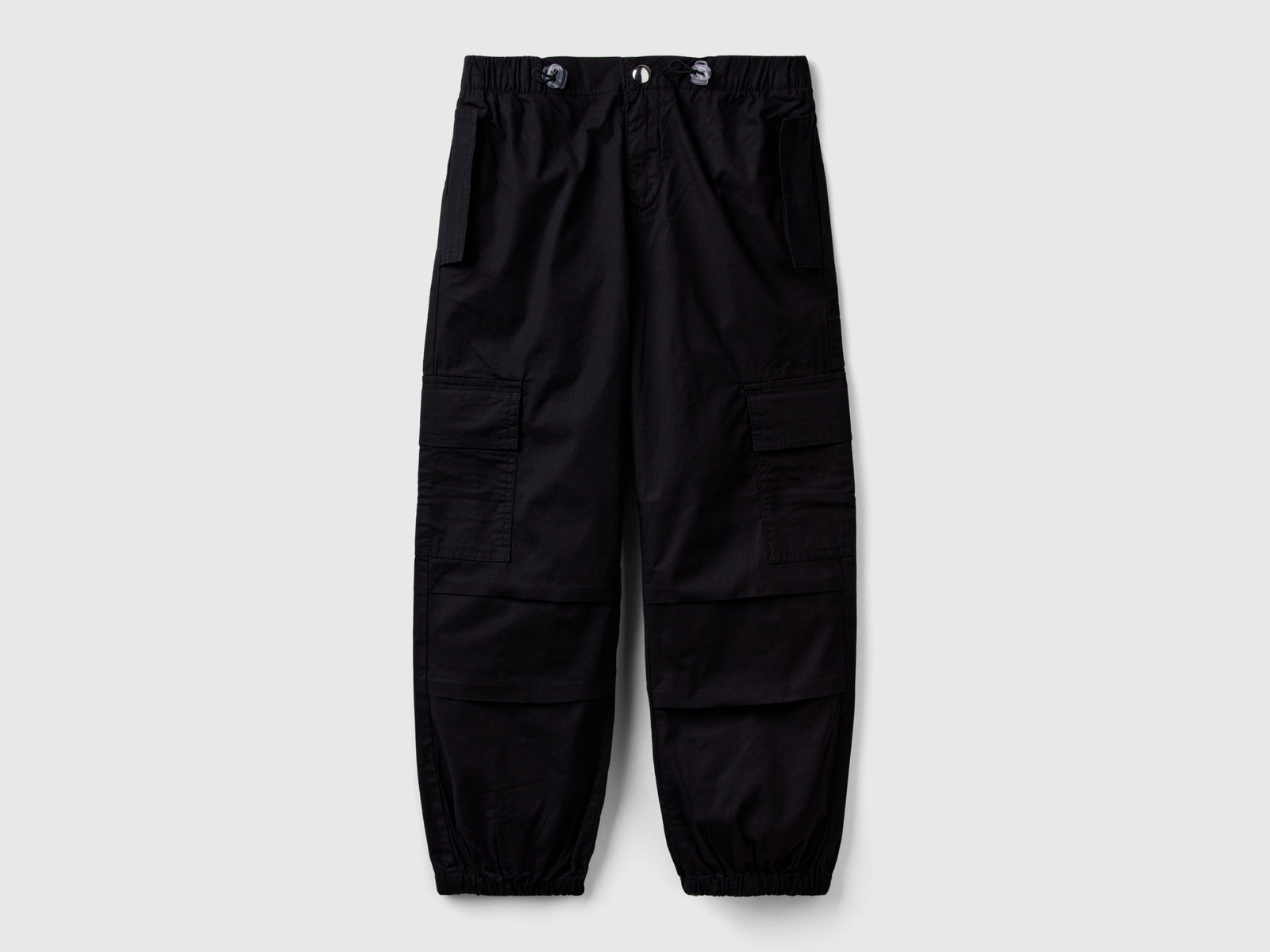 Pantaloni cargo in cotone stretch da bambina nero | Benetton Outlet