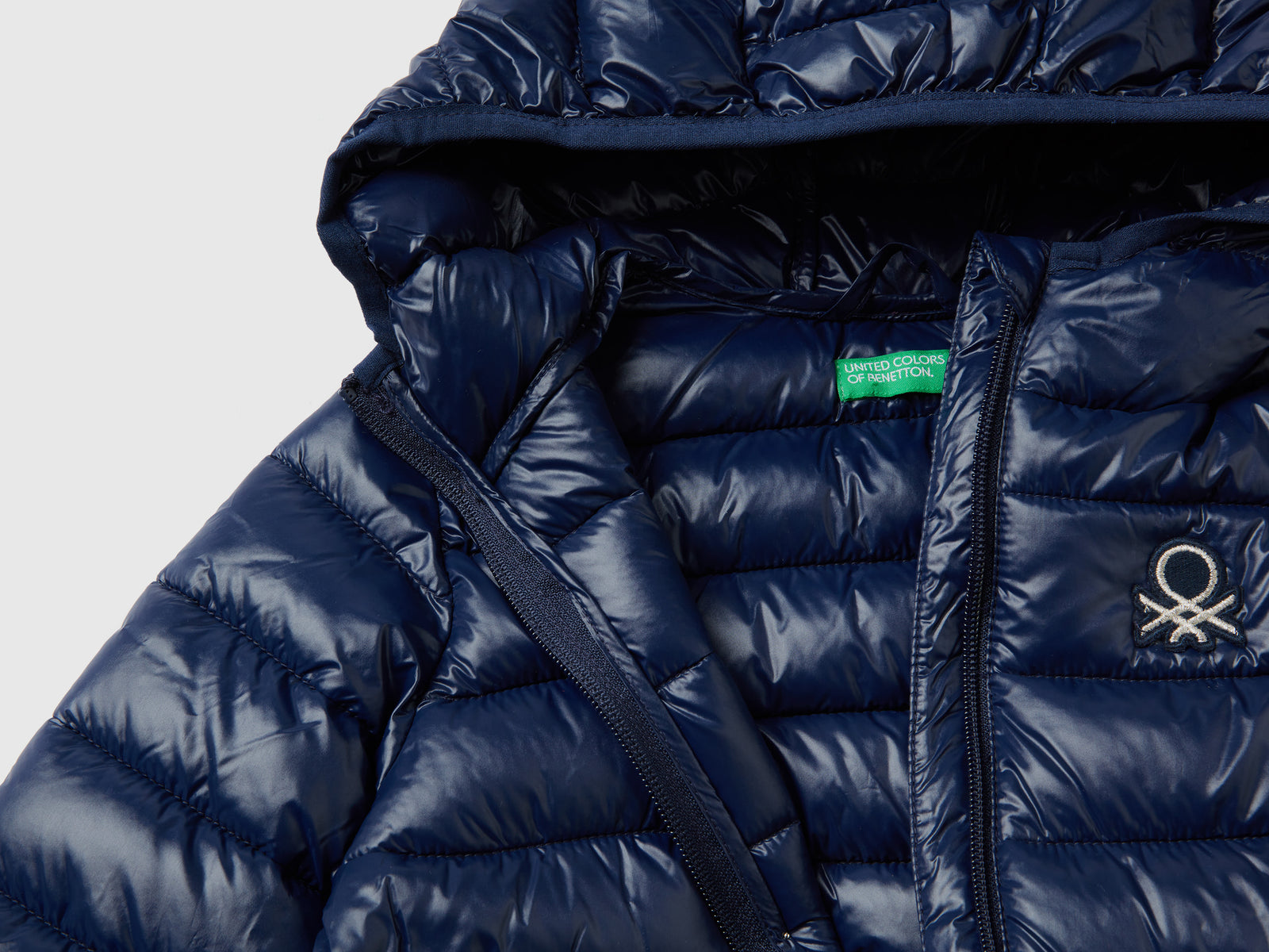 Giubbotto imbottito con cappuccio da bimba blu scuro 3 | Benetton Outlet