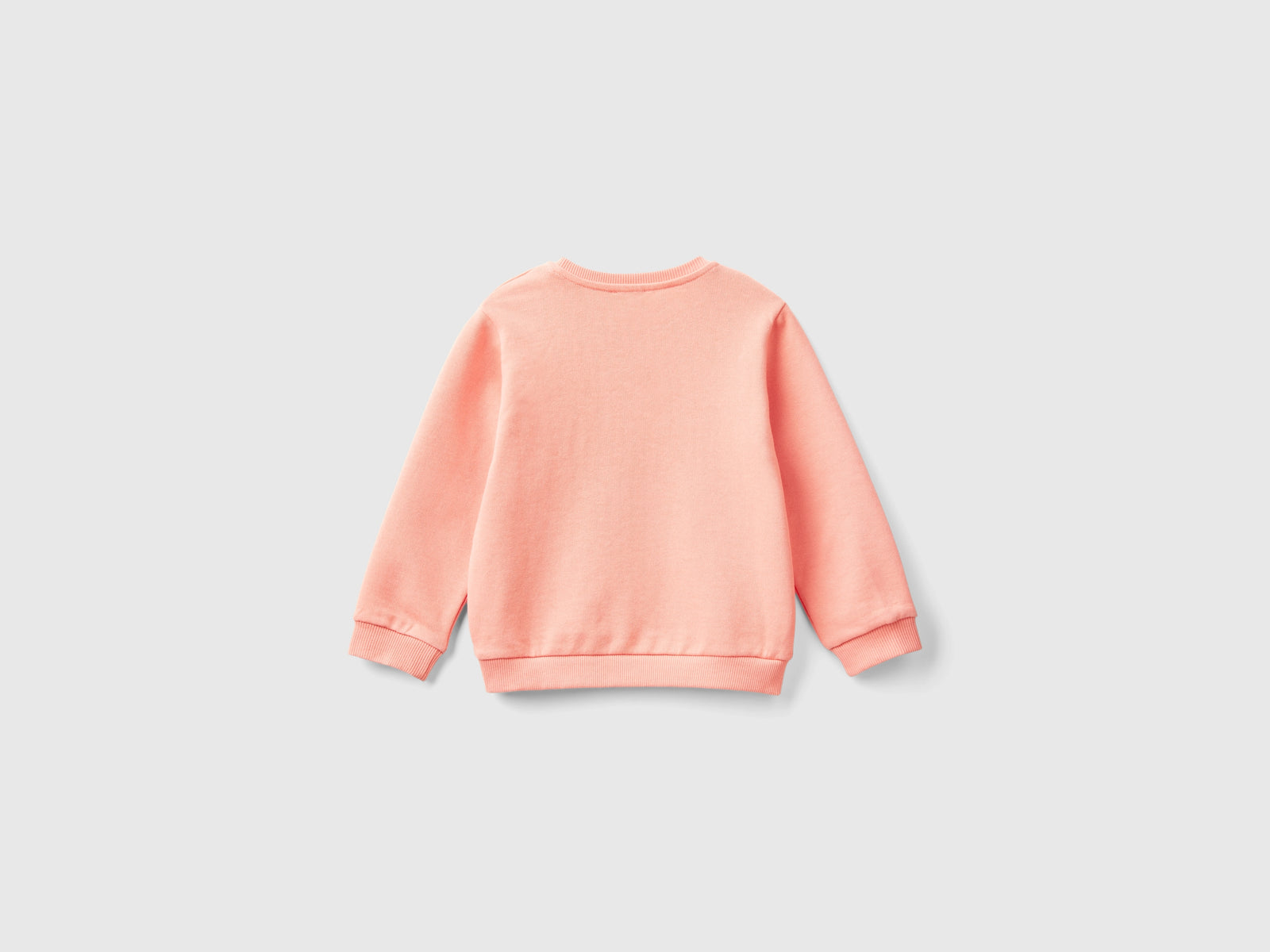 Felpa con applicazione effetto petali da bimba pesca 2 | Benetton Outlet