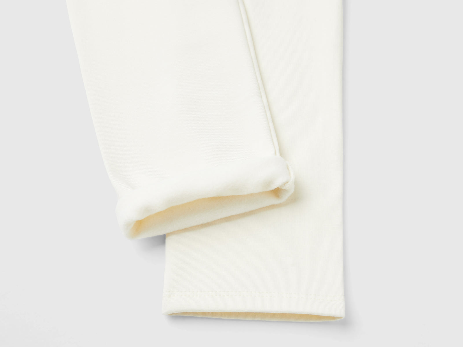 Leggings in felpa calda da bimba bianco panna 3 | Benetton Outlet
