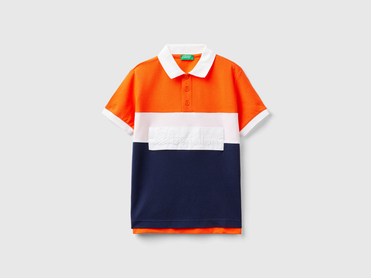 Polo color block in cotone bio da bambino arancione | Benetton Outlet