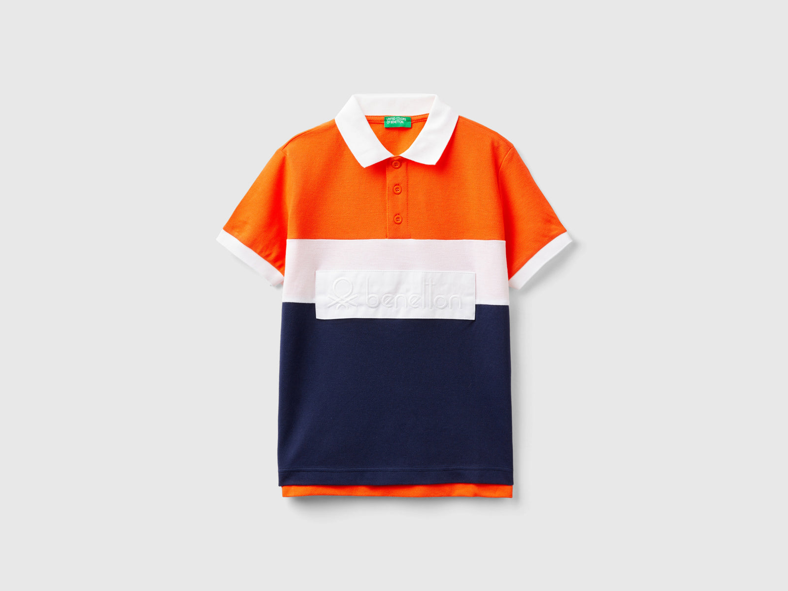 Polo color block in cotone bio da bambino arancione | Benetton Outlet