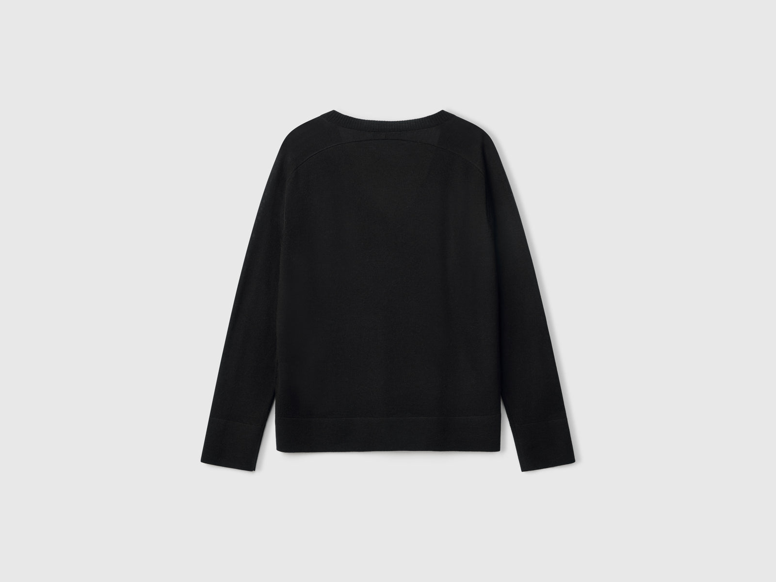 V-neck sweater in pure Merino wool da donna nero 2 | Benetton Outlet
