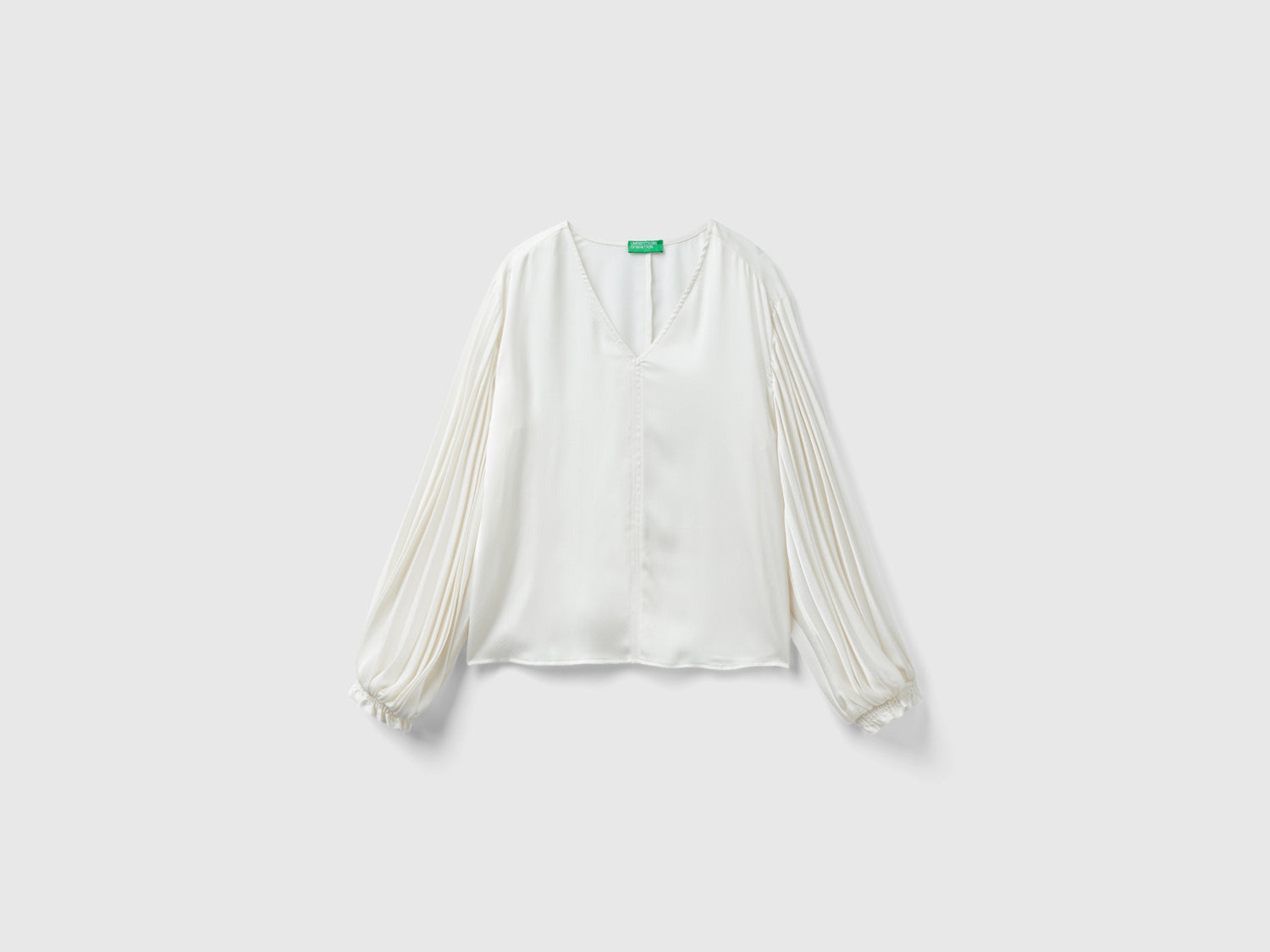 Blusa con manica lunga plissettata da donna bianco panna | Benetton Outlet