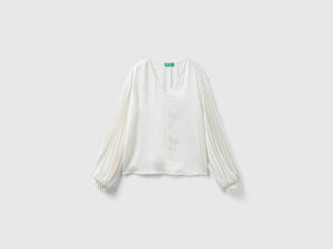 Blusa con manica lunga plissettata