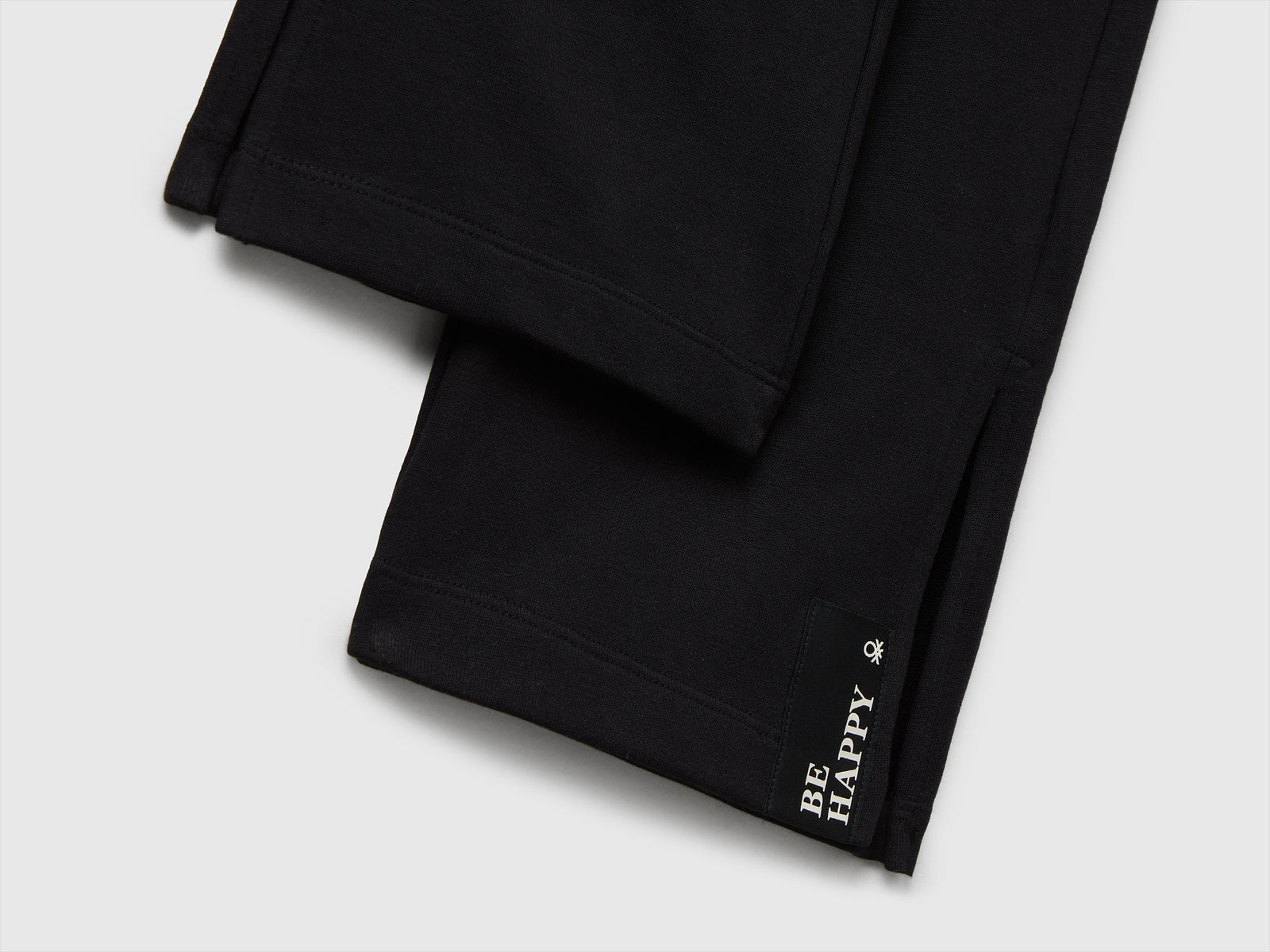 Pantaloni ampi in felpa da bambina nero 3 | Benetton Outlet