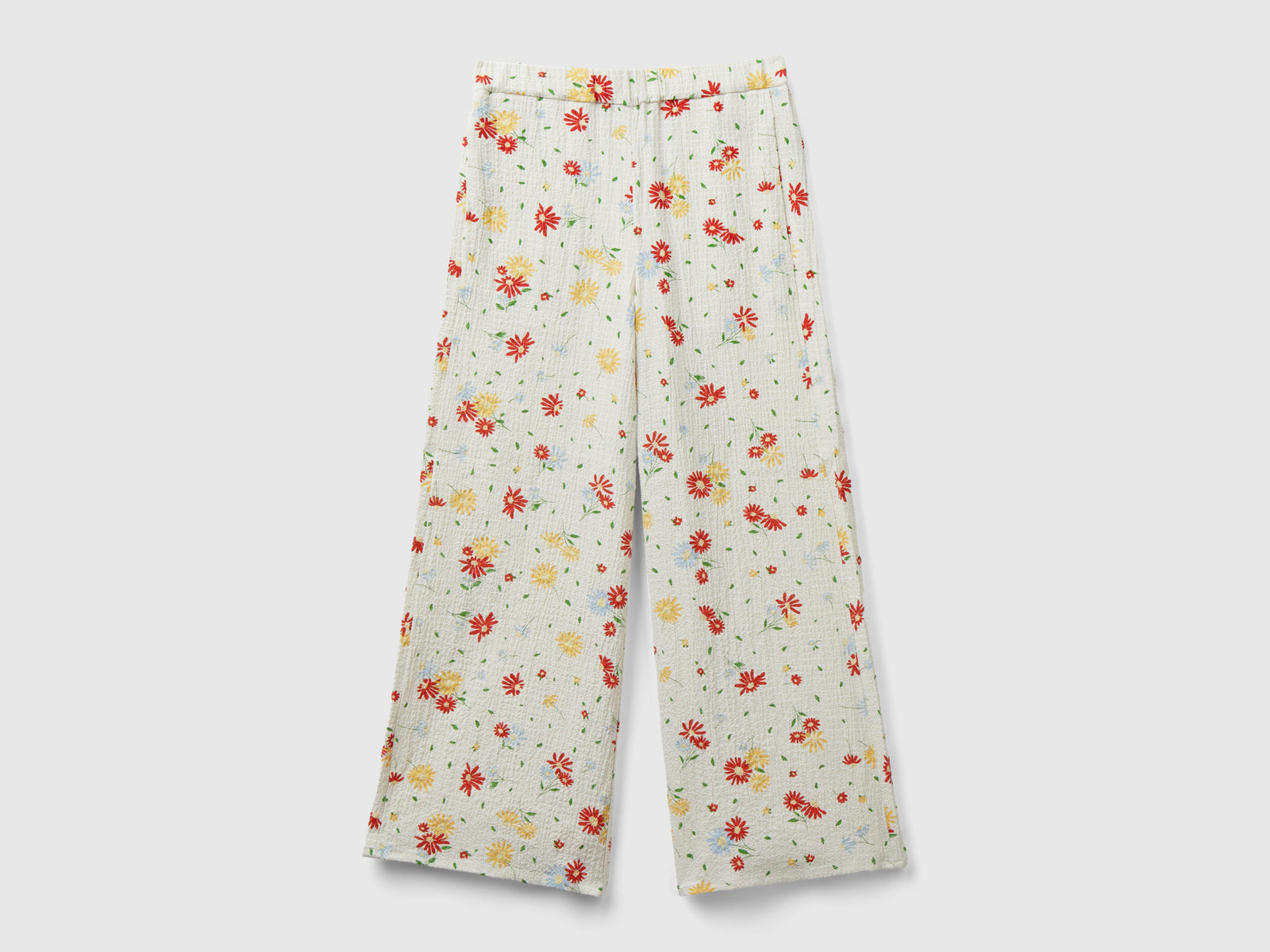 Pantaloni leggeri a fiori da bambina bianco panna | Benetton Outlet