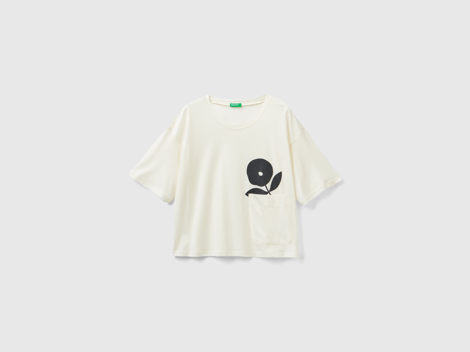 T-shirt boxy fit con fiore da donna bianco panna | Benetton Outlet