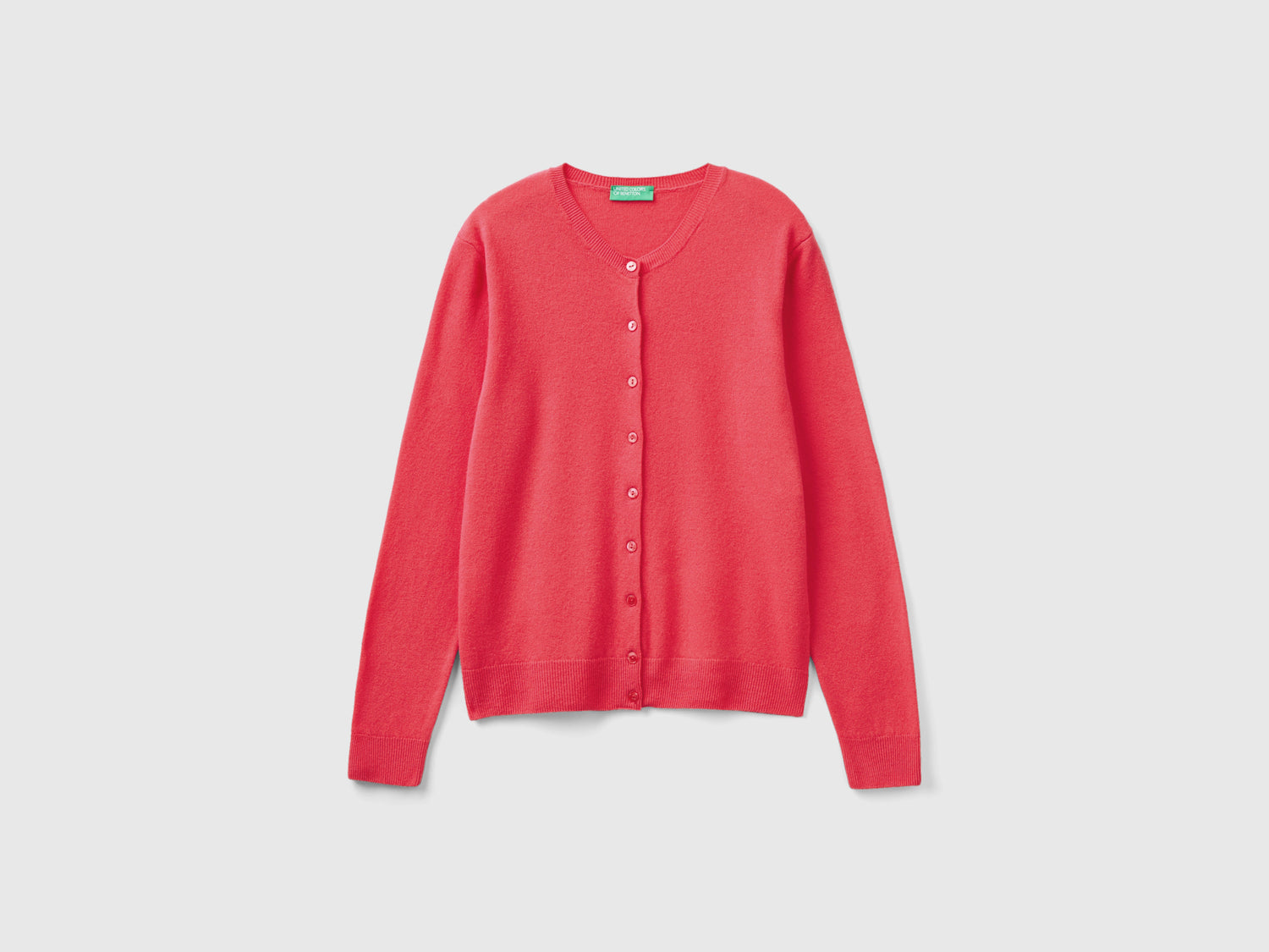 Cardigan girocollo in pura lana Merino da donna fucsia | Benetton Outlet