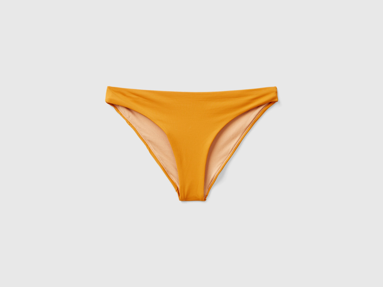 Slip costume basico in ECONYL® da donna senape | Benetton Outlet
