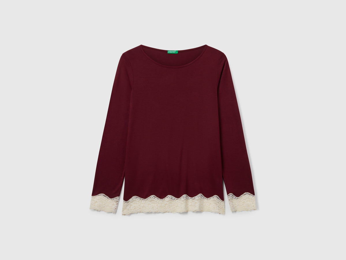Maglia fluida con pizzo