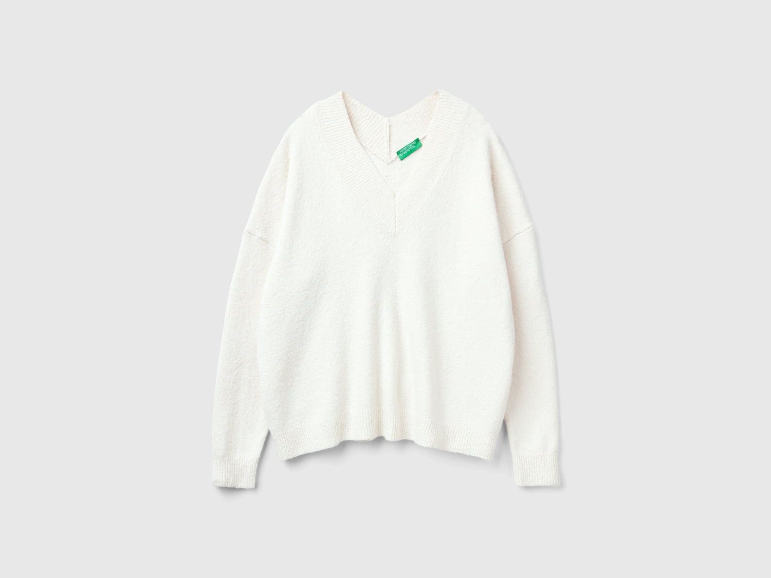 Maglia con scollo a V da donna bianco panna | Benetton Outlet