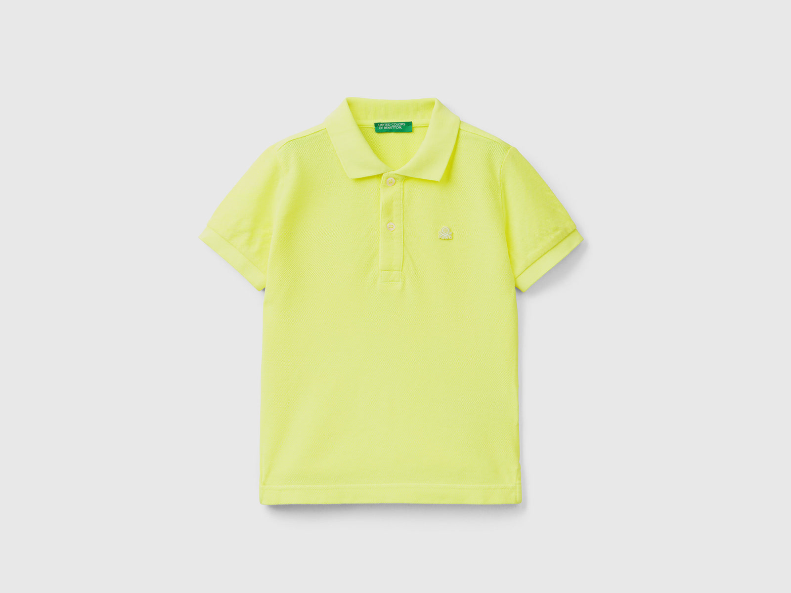 Polo fluo in cotone biologico da bimbo giallo fluo | Benetton Outlet