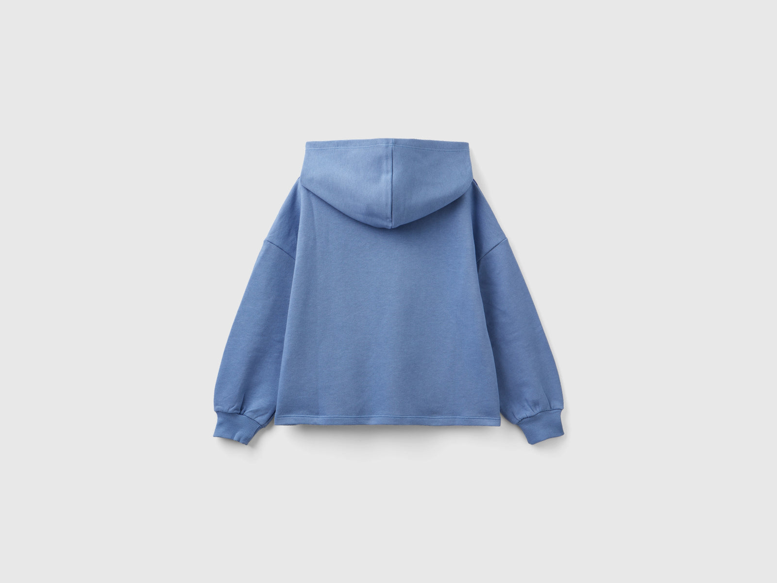 Felpa over fit con cappuccio da bambina azzurro 2 | Benetton Outlet