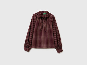 Blusa a quadri con fiocco