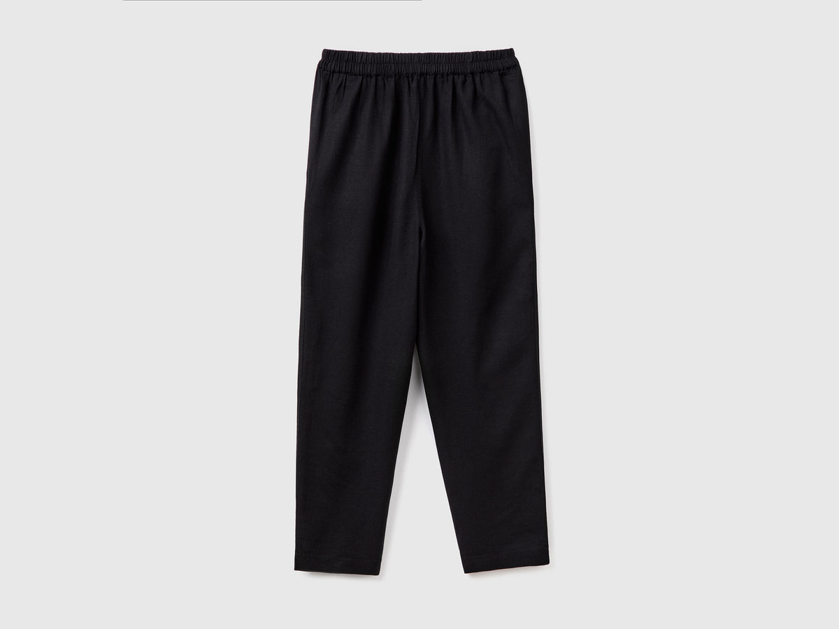 Pantaloni lunghi carrot fit in lino misto viscosa