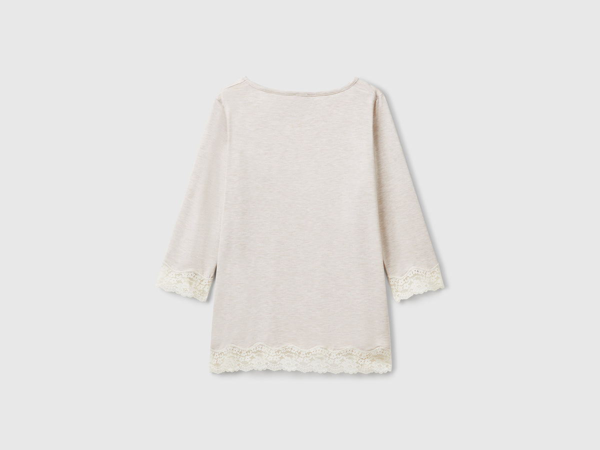 Maglia fluida con dettagli in pizzo