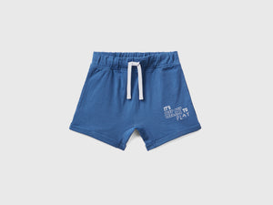 Shorts in puro cotone con stampa frontale e tasche inserite nei fianchi