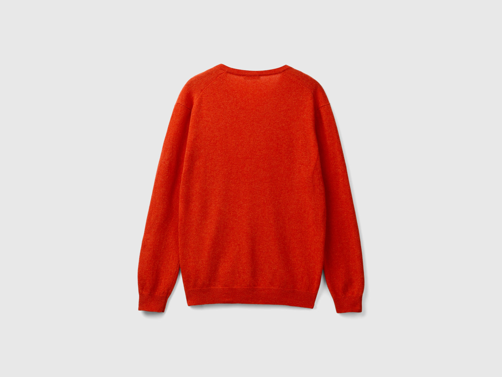 Maglia scollo a V mélange in pura lana Merino da uomo arancione 2 | Benetton Outlet