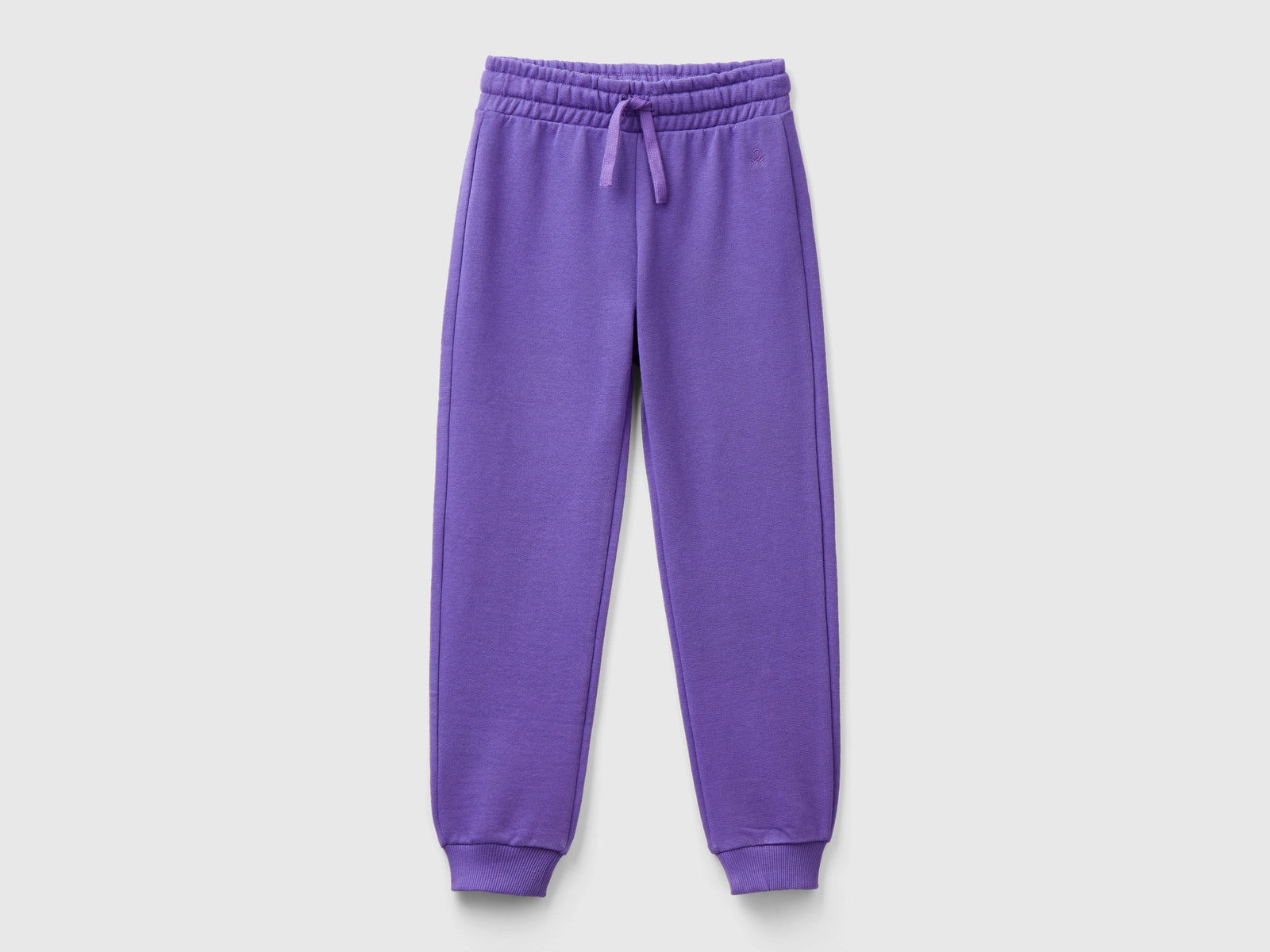 Pantaloni in felpa con logo da bambina viola | Benetton Outlet