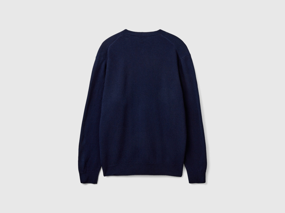 Cardigan blu notte scollo a V in pura lana Merino