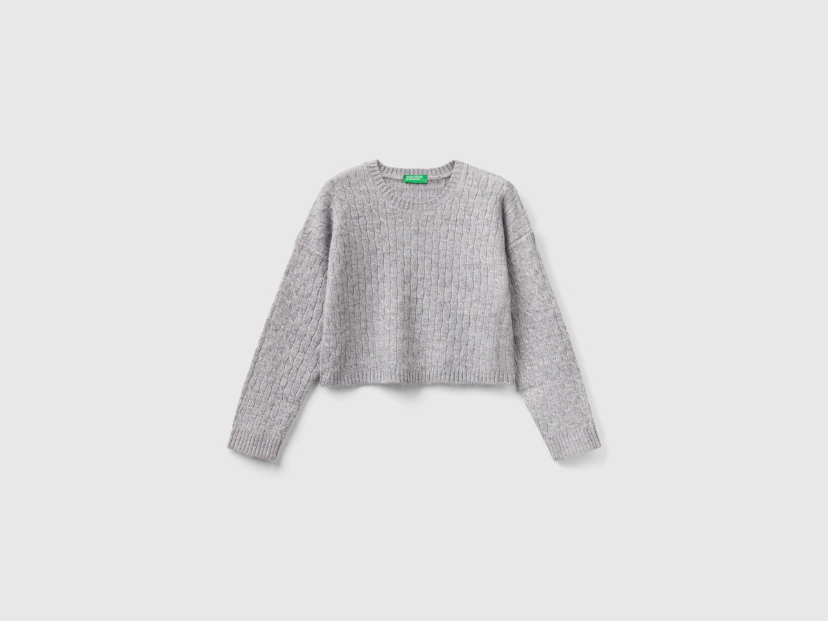 Maglione con trecce