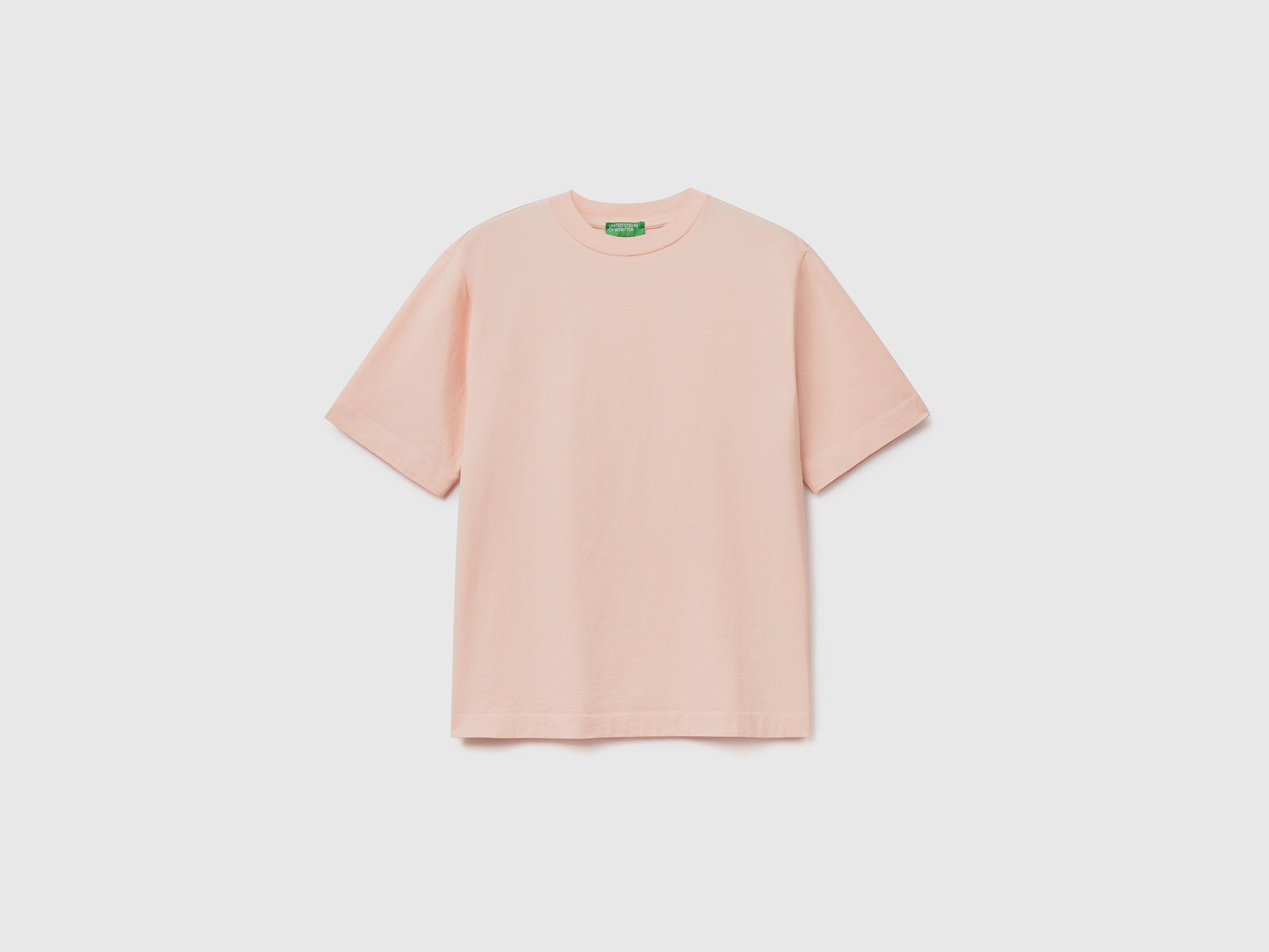 T-shirt girocollo a manica corta realizzata in puro cotone da donna rosa | Benetton Outlet