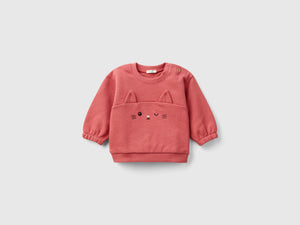Felpa con ricamo e patch in cotone bio